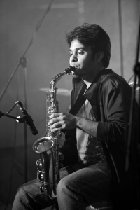 There were some thrilling flourishes on the saxophone, as the guitars and saxophone guided the melodic arrangements of their songs forward.<br/><span class='courtesyName'> Photo Courtesy - Vijay Kate  </span> 